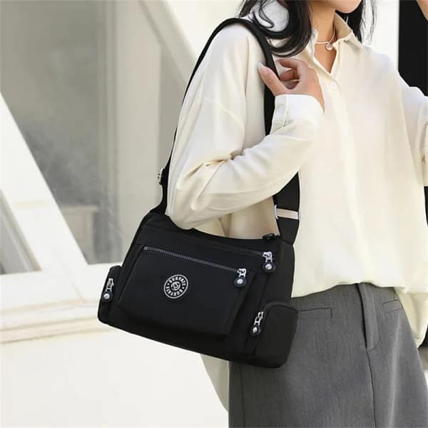 S0c8764aee5004b88bfa49a64ab1f760a3.webp Waterproof Crossbody Bag Women Nylon Travel