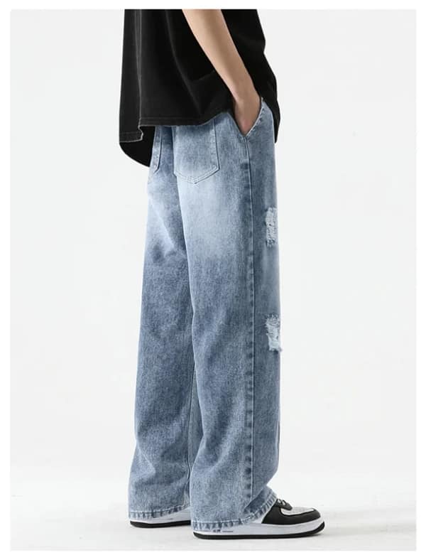 S43c77b385a3c431ba4fc9d44d4d383a98.webp Light Blue Jeans Ripped Men Loose Fit